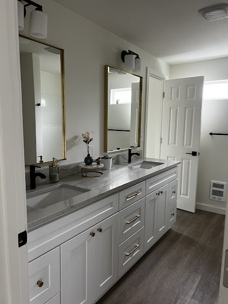 Completed bathroom remodel with double vanity